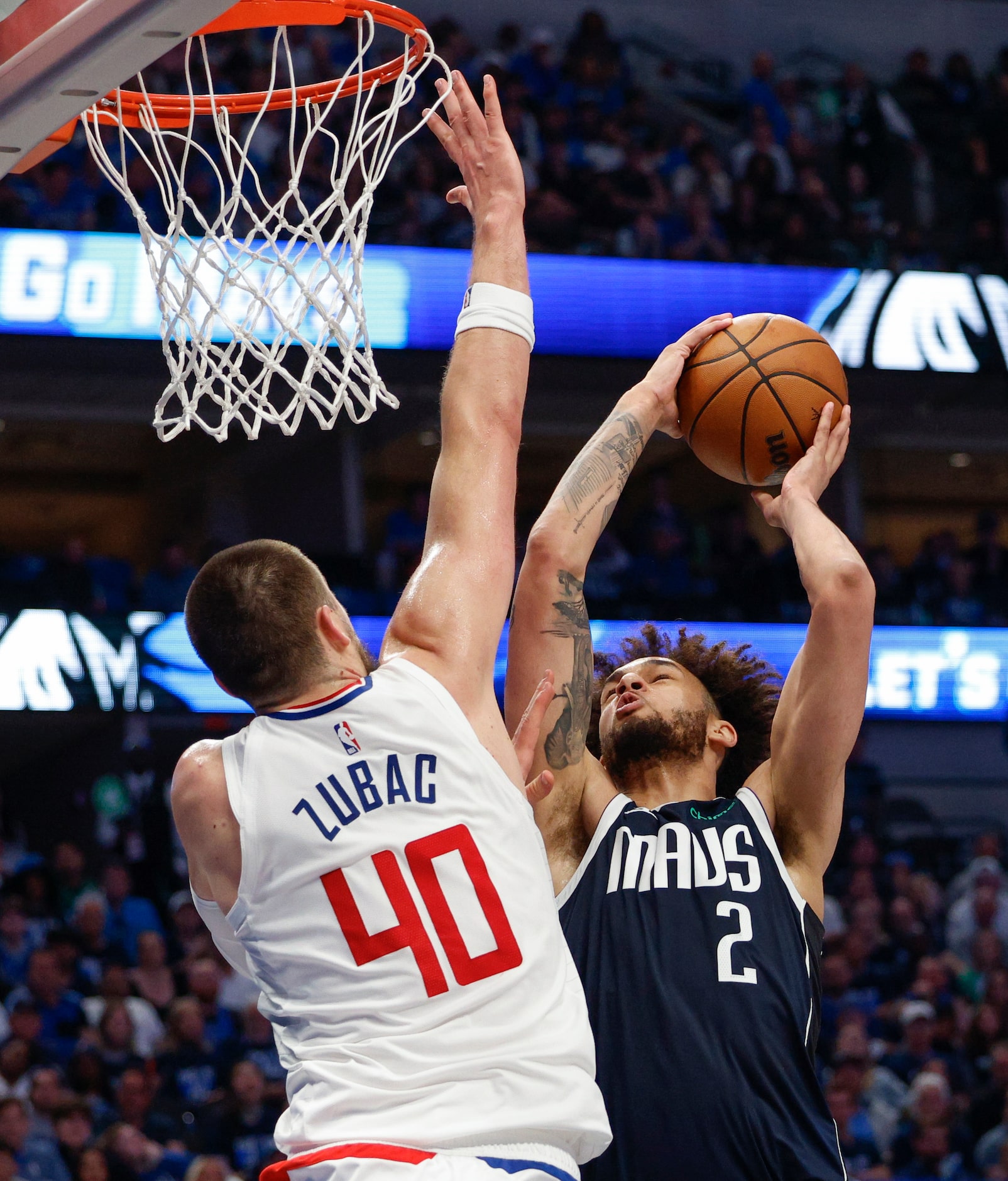 LA Clippers center Ivica Zubac (40) fouls Dallas Mavericks center Dereck Lively II (2) as he...