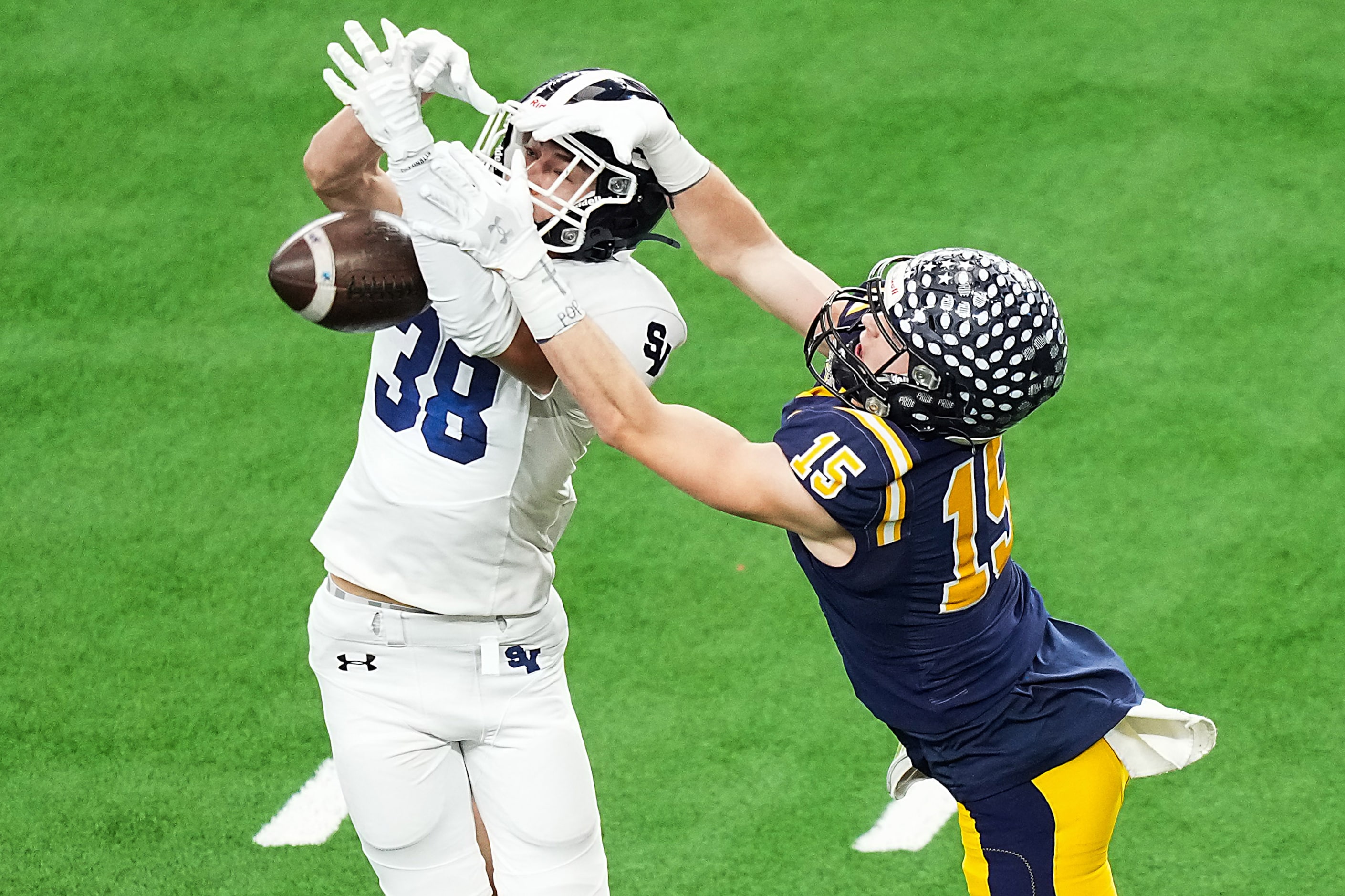 Smithson Valley's Hunter Haug (38) breaks up a pass intended for Highland Park's Benton...