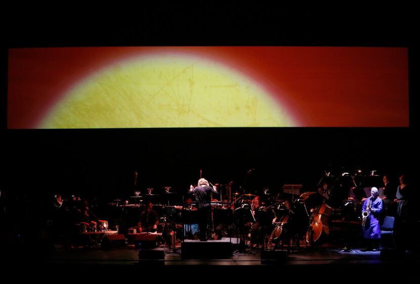 The orchestra plays during a dress rehearsal of Arjuna's Dilemma at the Winspear Opera House...