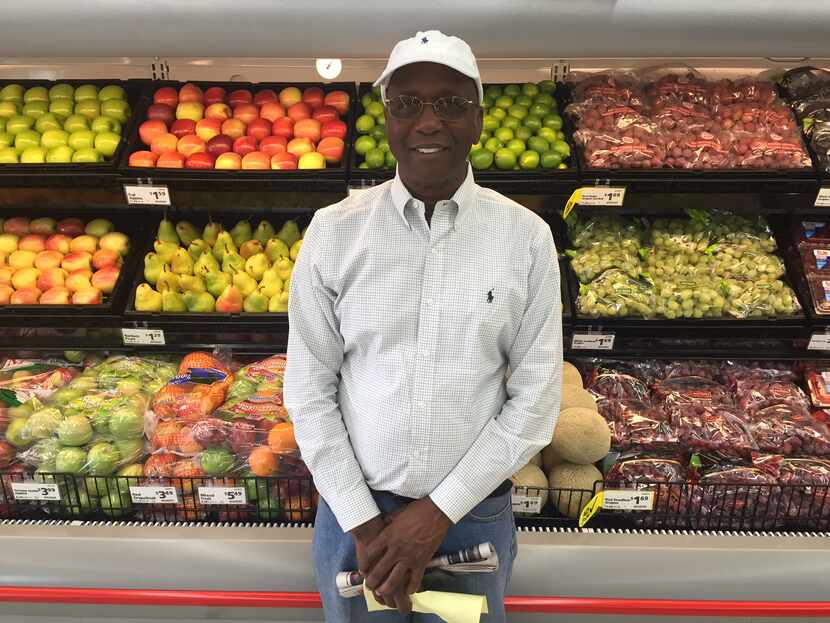 Joseph Kemp stands in front of produce at his new Save-A-Lot store at 3450 Simpson Stuart...