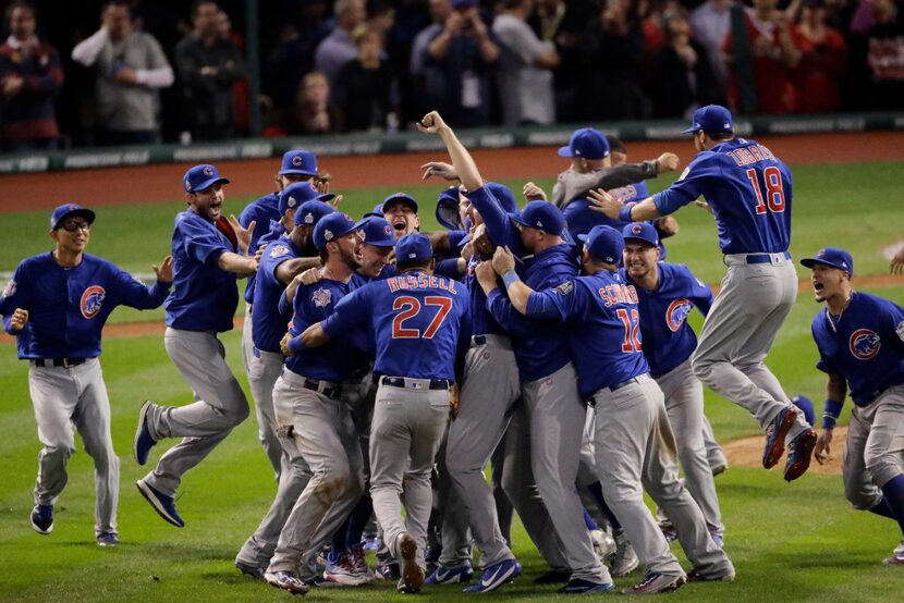 FILE - In this Nov. 3, 2016 file photo, Chicago Cubs celebrate after Game 7 of the Major...