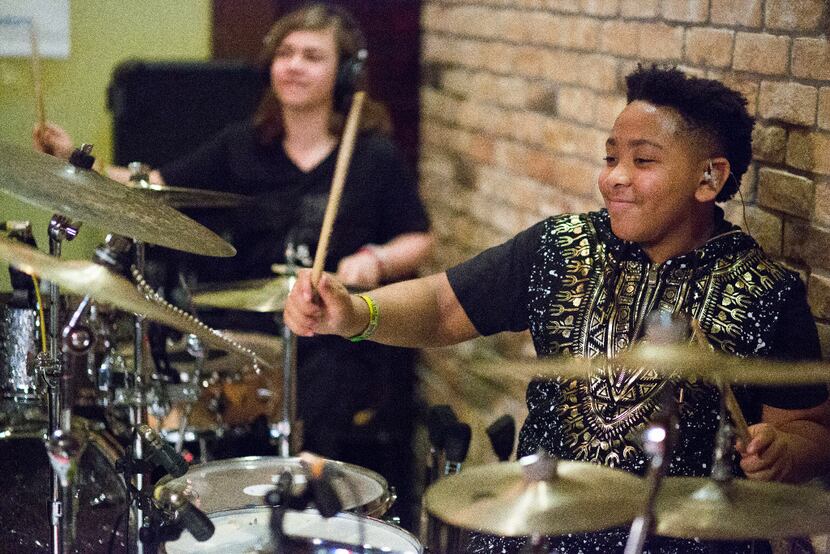 The Drummies, including AD Roberts, 11, right, and JD Beck, 13, left, perform at the TenOak...