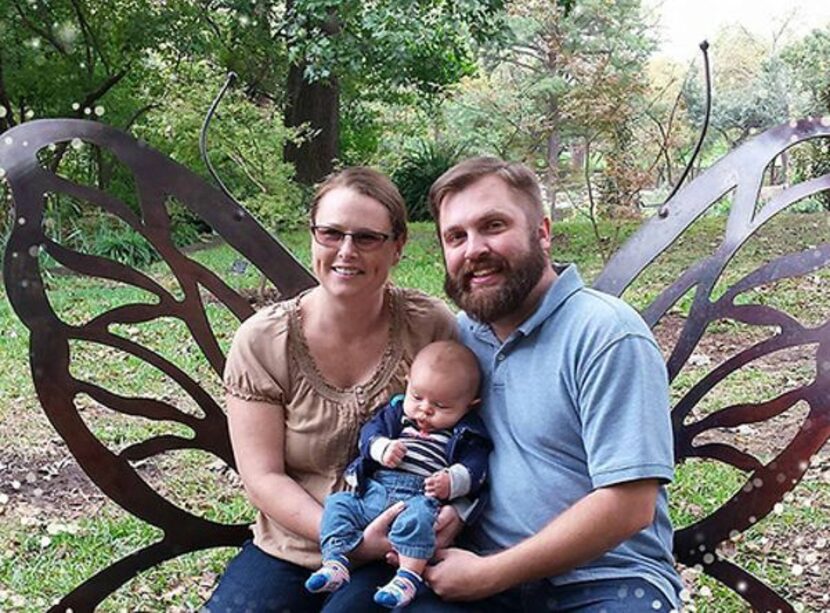 Shanna and Craig Vandewege pose with baby Diederik. 