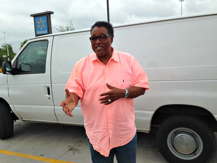 Caraway on the campaign trail Monday, showing reporters the Wal-Mart built during his first...