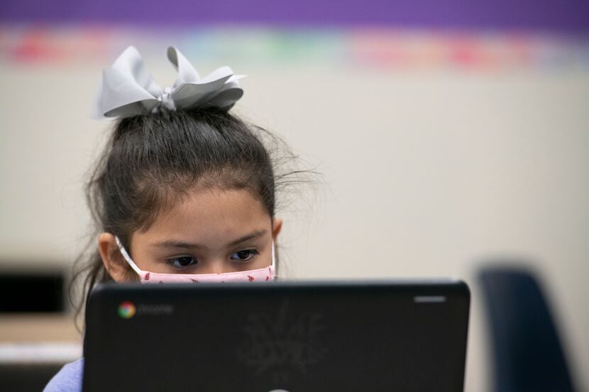 A student of Mesquite ISD participates in a classroom session on a computer. Mesquite ISD is...