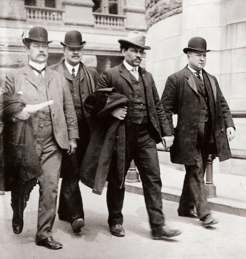 Joseph Petrosino (far right) leads a Black Hand suspect to court. From The Black Hand, by...