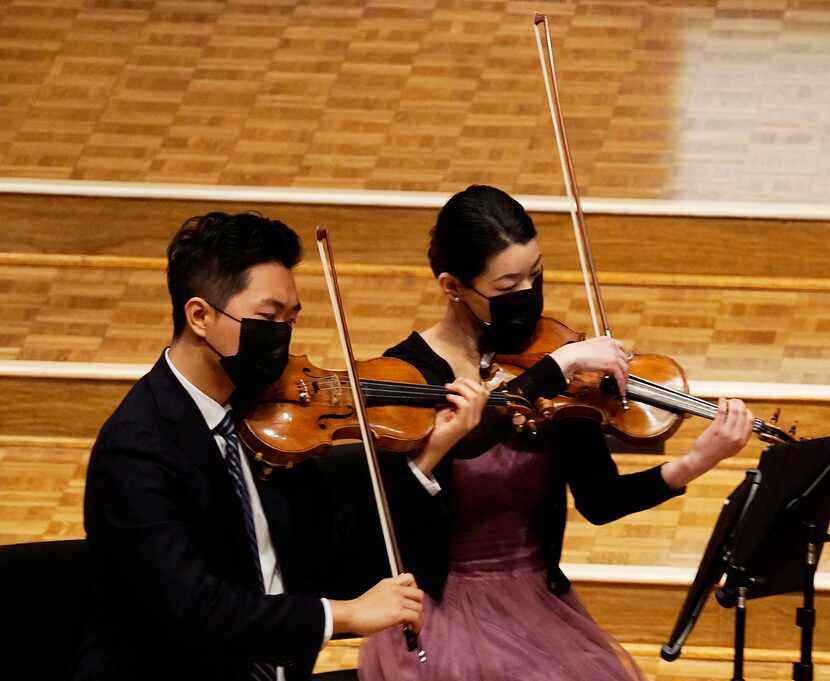 Violinists Hao Zhou and Lucy Wang play with the Viano String Quartet at Lovers Lane United...