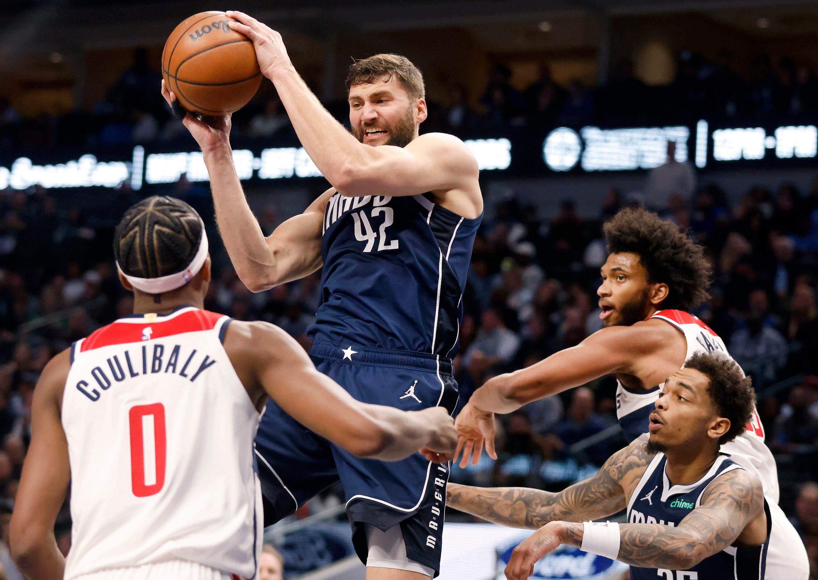 Dallas Mavericks forward Maxi Kleber (42) comes down with a defensive rebound against...