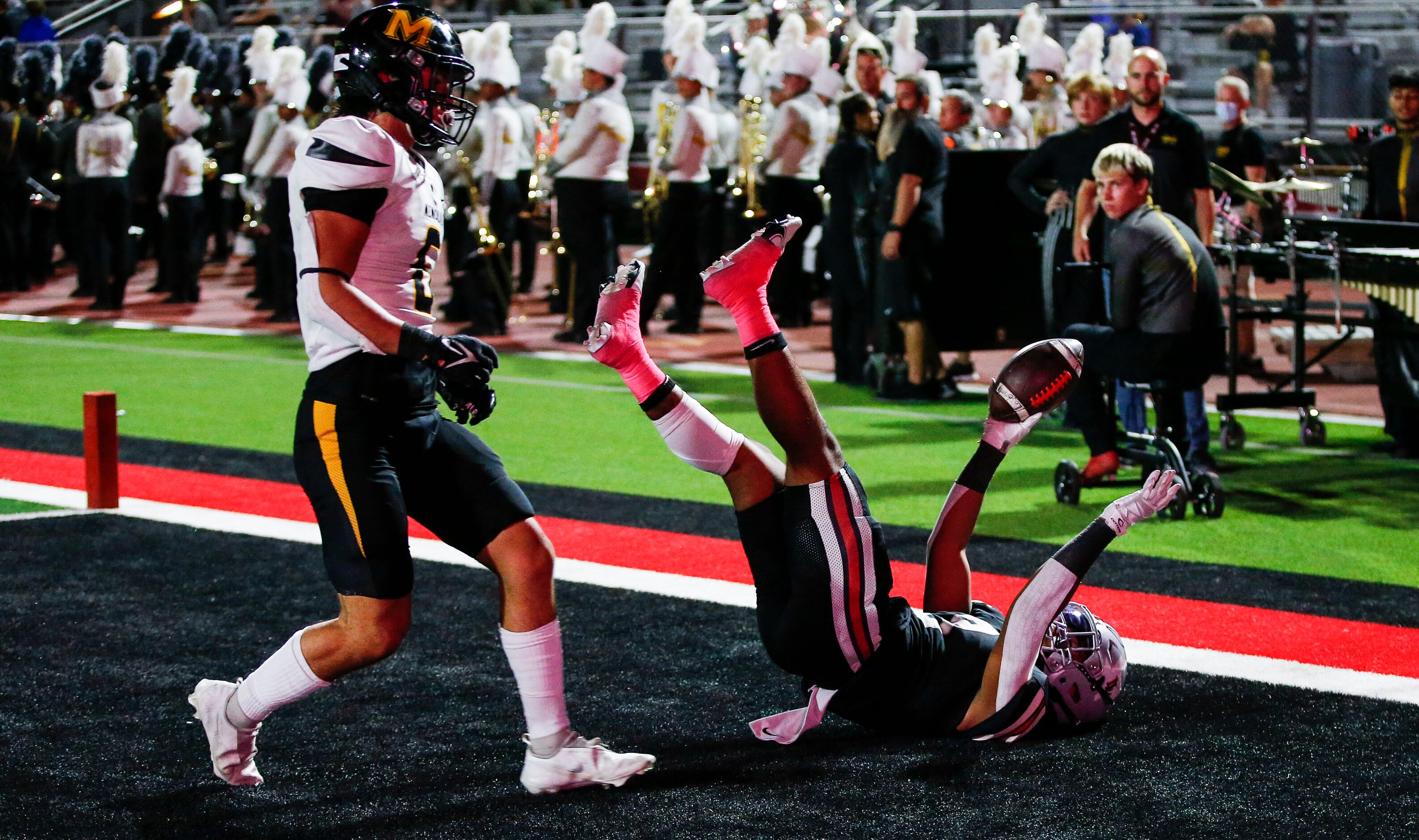 Lovejoy senior running back Noah Naidoo, right, catches a pass for a touchdown as Frisco...