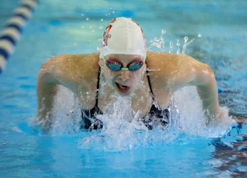 Junior Irina Starostin, a UIL state qualifier from Woodrow Wilson High School, works on her...