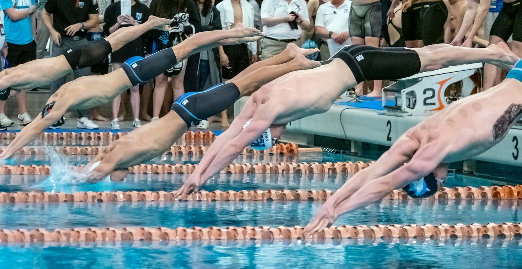 Keller’s River Paulk, second from right, leaves the blocks as he competes in the 200...