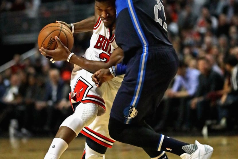 Wesley Matthews' defense, like here against Chicago's Jimmy Butler, is becoming one of the...