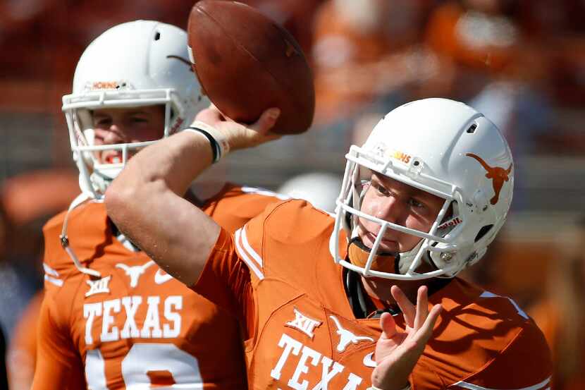 Texas quarterback Shane Buechele (7) throws the ball during the warm-up at Darrell K Royal...