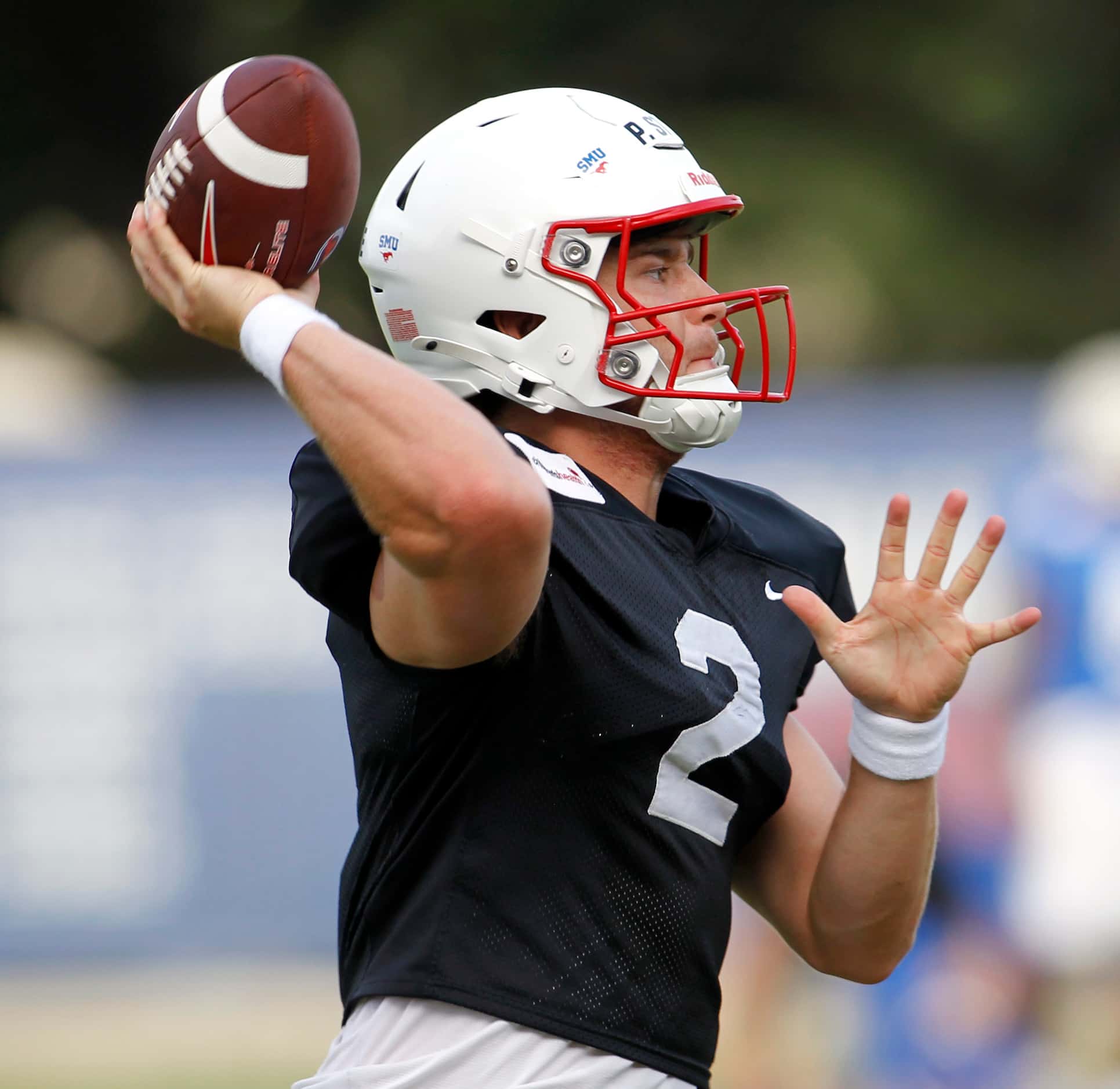 SMU Mustangs starting quarterback Preston Stone (2), launches a pass during a team practice...