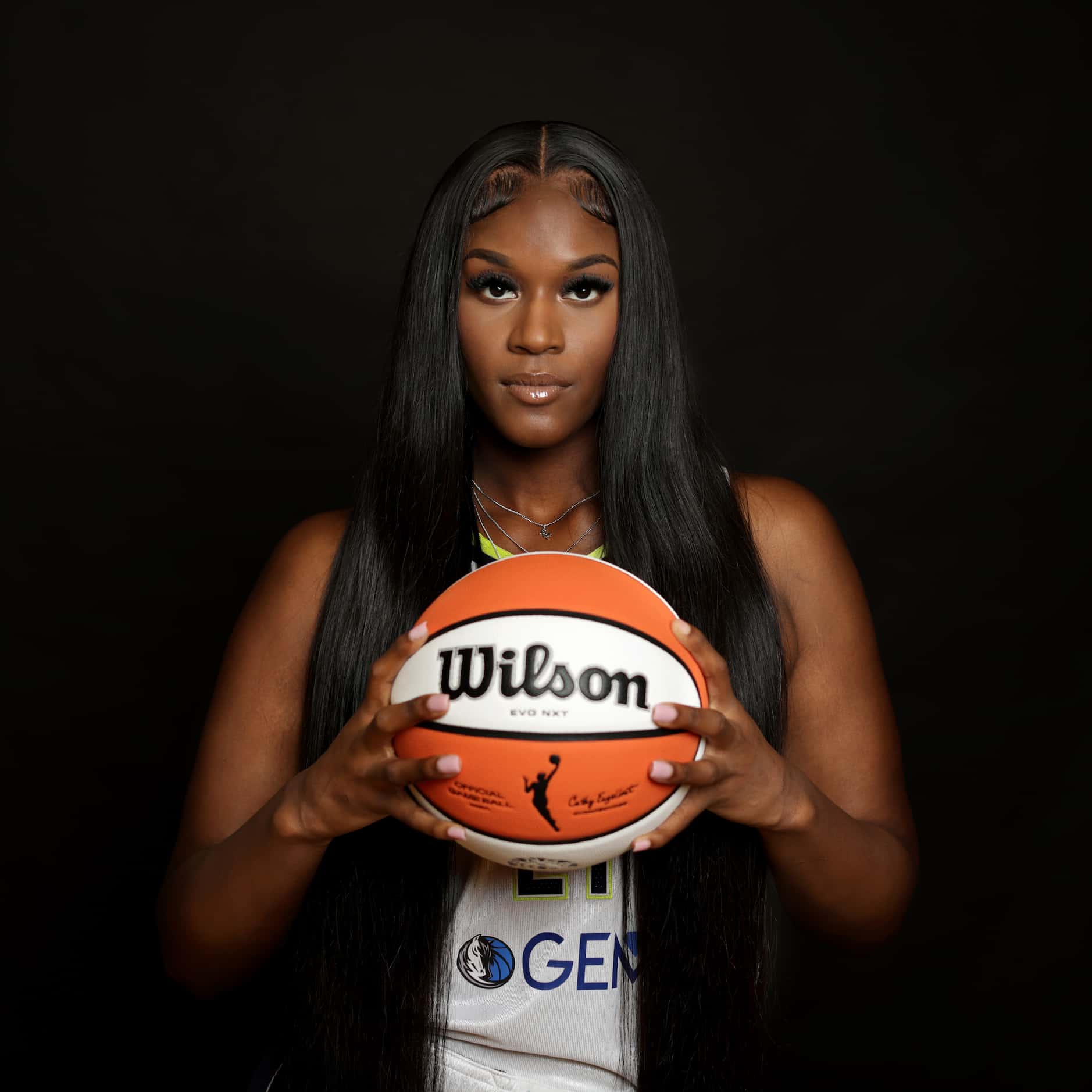 #21 Kalani Brown with The Dallas Wings poses for a photograph at College Park Center in...