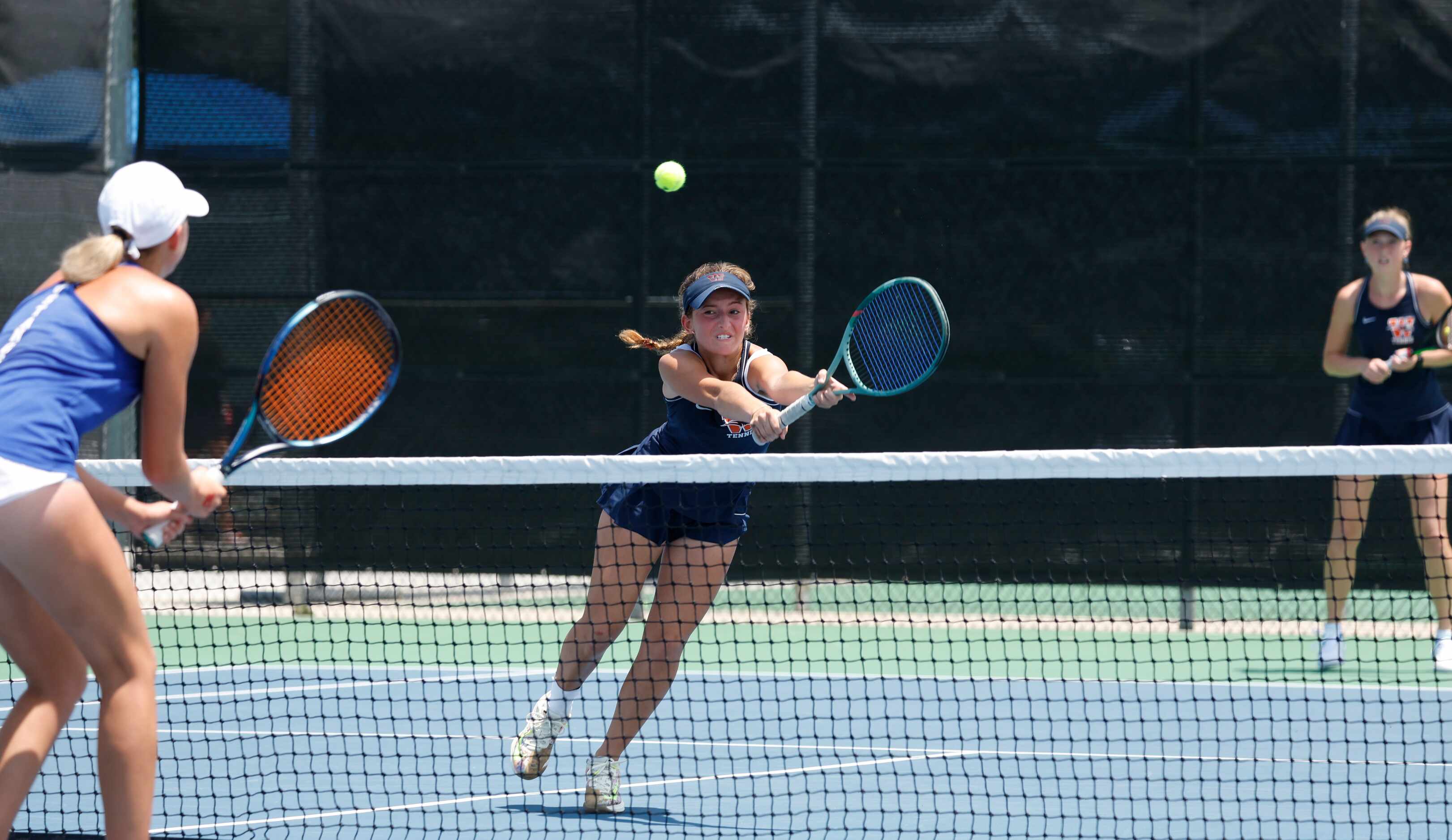 5A girls doubles final: Frisco Wakeland's Ella Wertz dives for the ball as  Mariella Davie ,...