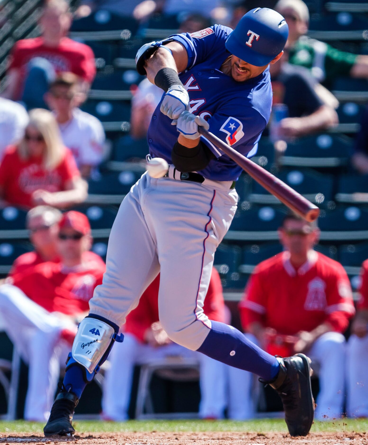 Texas Rangers first baseman Ronald Guzmân hits a solo home run during the second inning of...