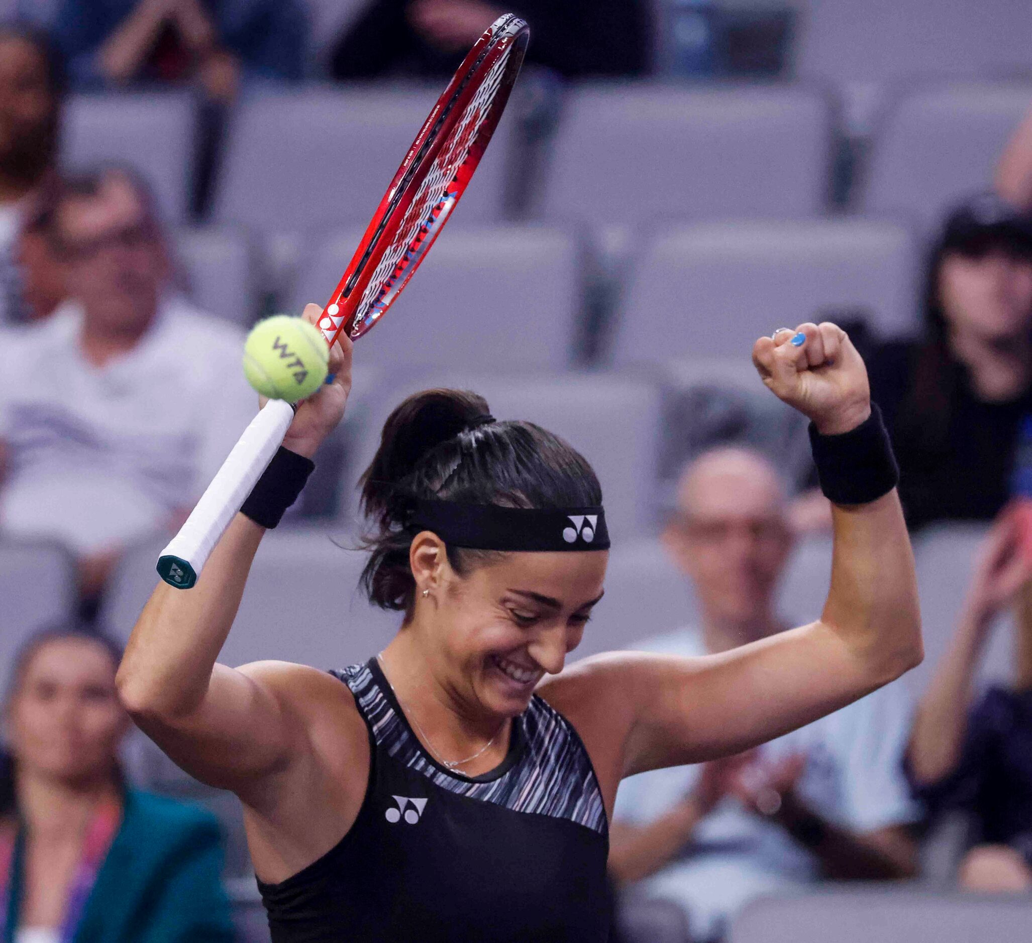 Caroline Garcia of France celebrates after winning her match against Coco Gauff of the USA...