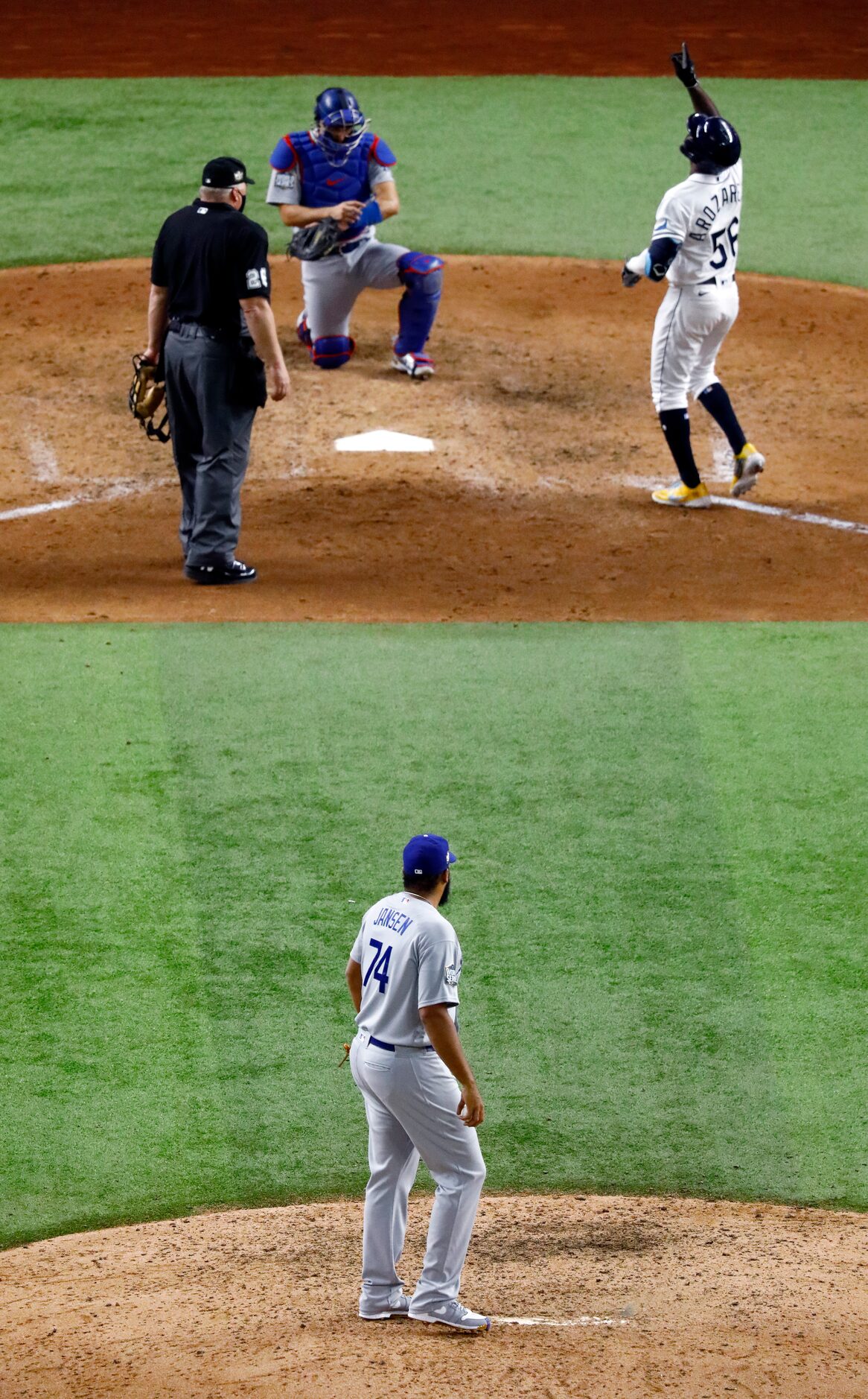 Los Angeles Dodgers relief pitcher Kenley Jansen (74) watches Tampa Bay Rays Randy Arozarena...