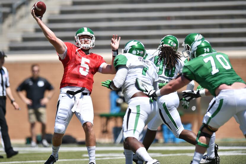 North Texas senior quarterback Alec Morris (5) throws in the 2016 Green-White Spring...