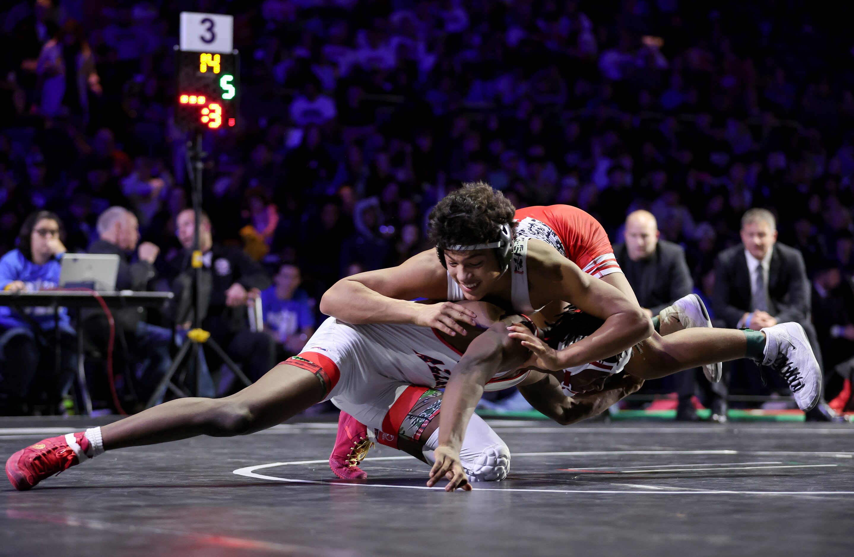 Javin Jackson-Bey (white) of Allen competes against Nicholas Zamora of Arlington Martin in...