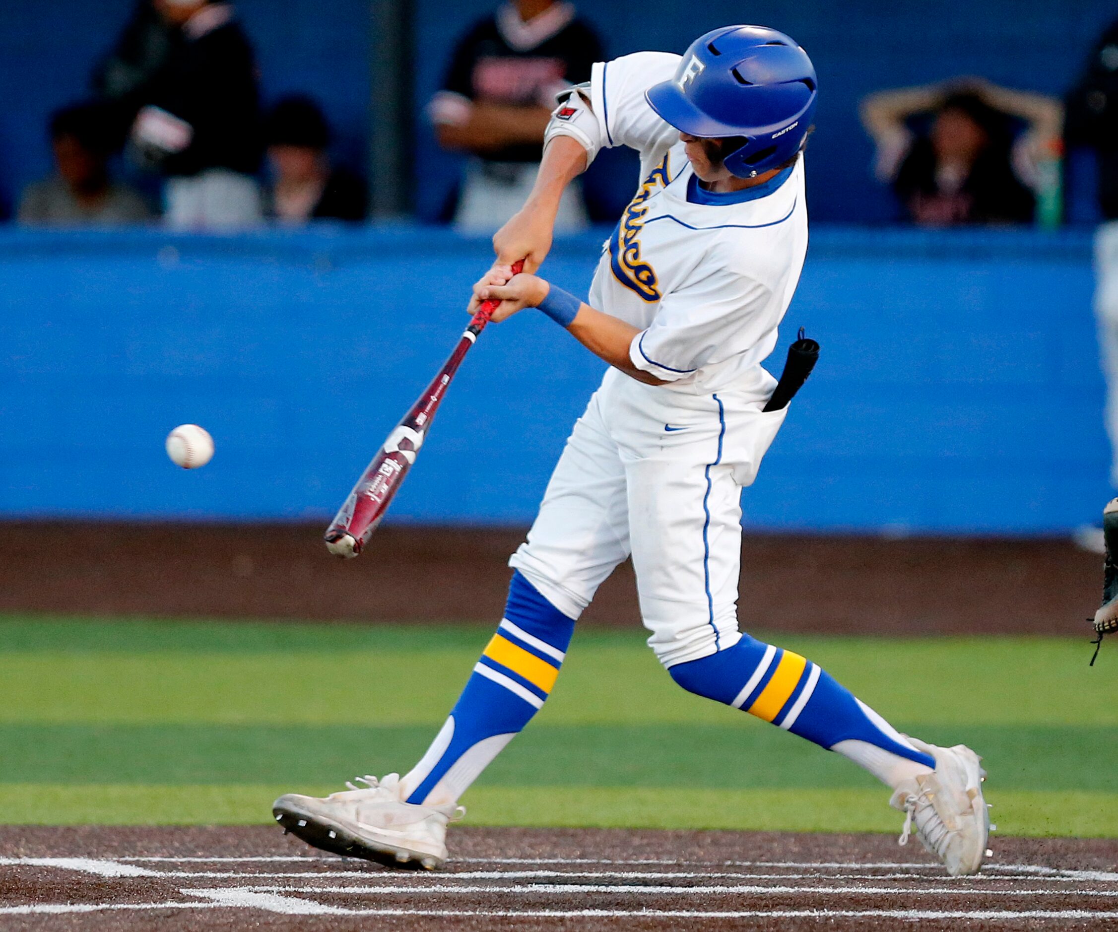 Frisco right fielder Lacob Sparks (23) makes contact in the third inning as Frisco High...