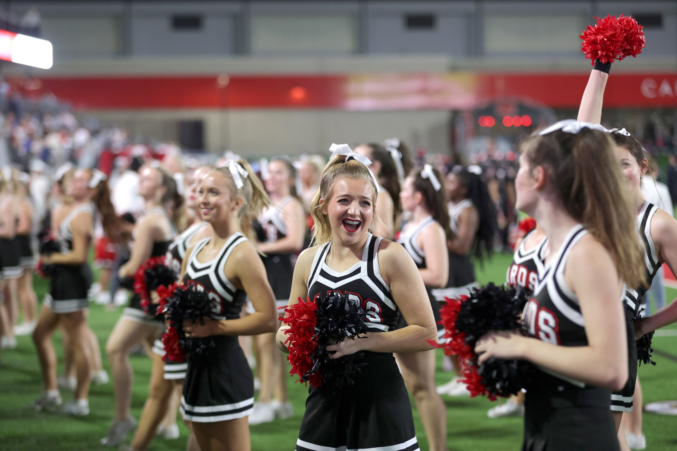 The Melissa cheerleaders celebrate a run during the Prosper Walnut Grove High School at...