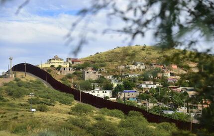 The state of Sonora on the Mexico side of the border is seen across the border wall from...