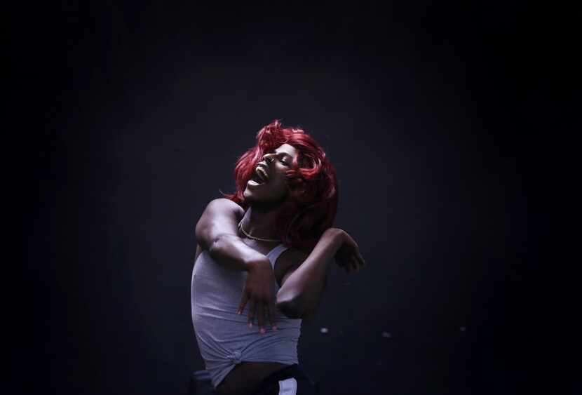 Demerric Strickland vogues during a voguing practice at United Black Ellument in Dallas on...