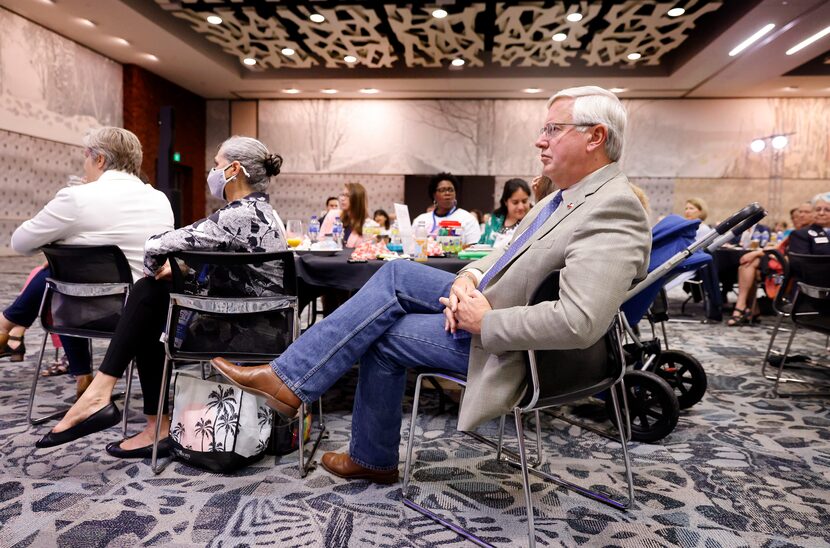 Texas lieutenant governor challenger Mike Collier listened to speakers during the Lady Bird...