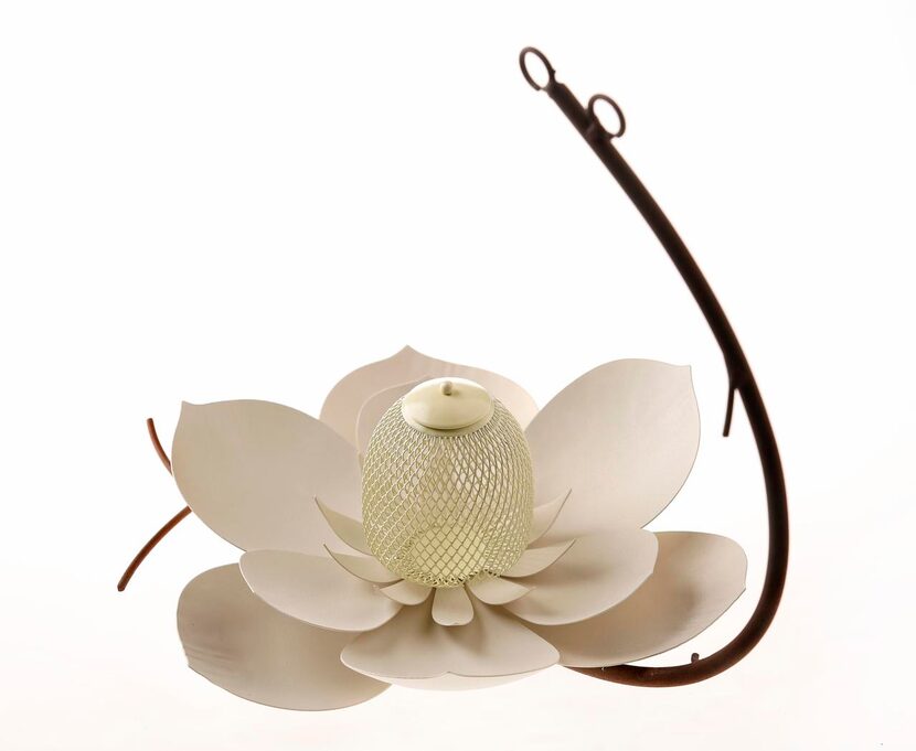 
Creamy Southern magnolias inspired the powder-coated steel bird feeder. Dropped seeds and...