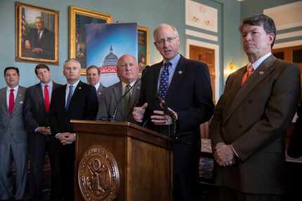 House Agriculture Committee Chairman Mike Conaway, R-Texas, and other Republican members of...