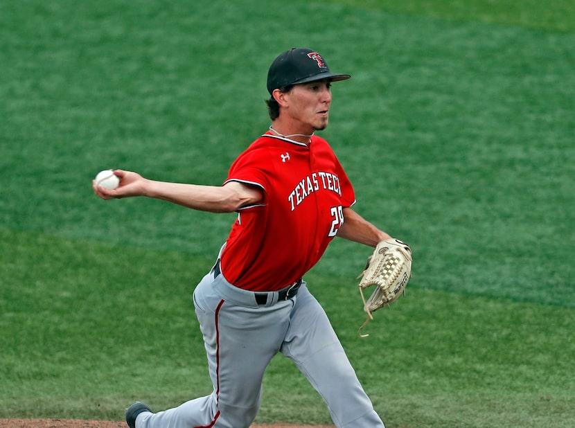 Texas Tech's Taylor Floyd pitches to a Dallas Baptist batter during an NCAA college baseball...