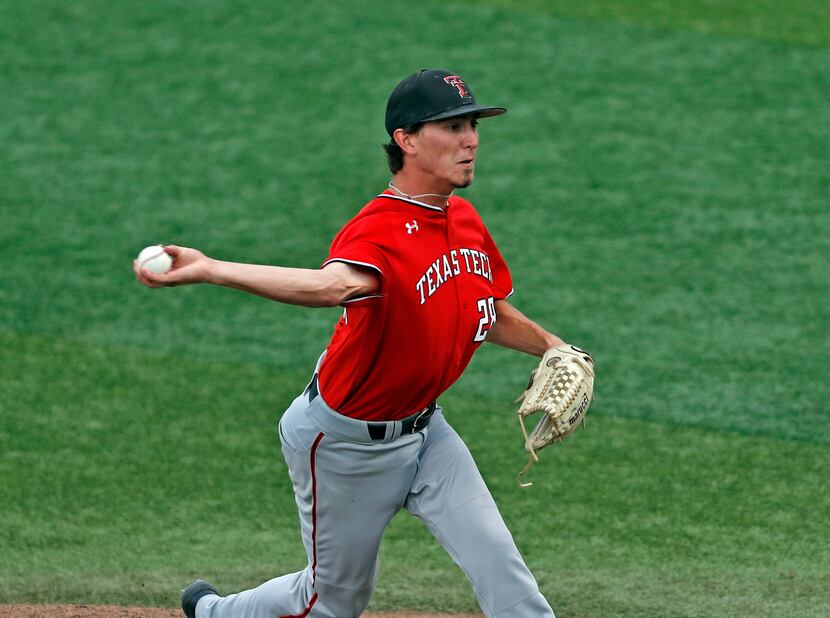 Texas Tech's Taylor Floyd pitches to a Dallas Baptist batter during an NCAA college baseball...