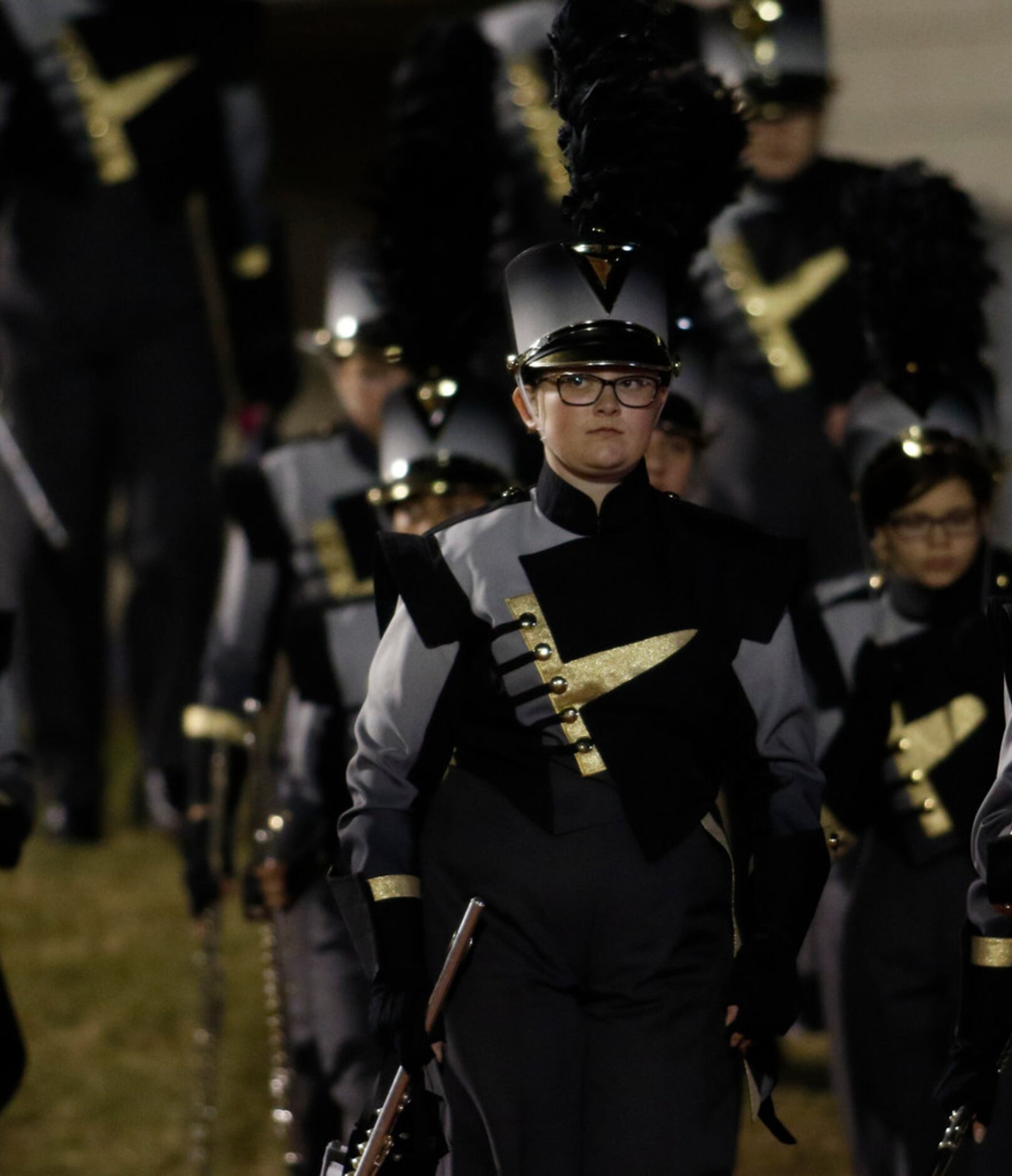 Members of the Royse City band prepare to perform at halftime of the Ennis versus Royse City...
