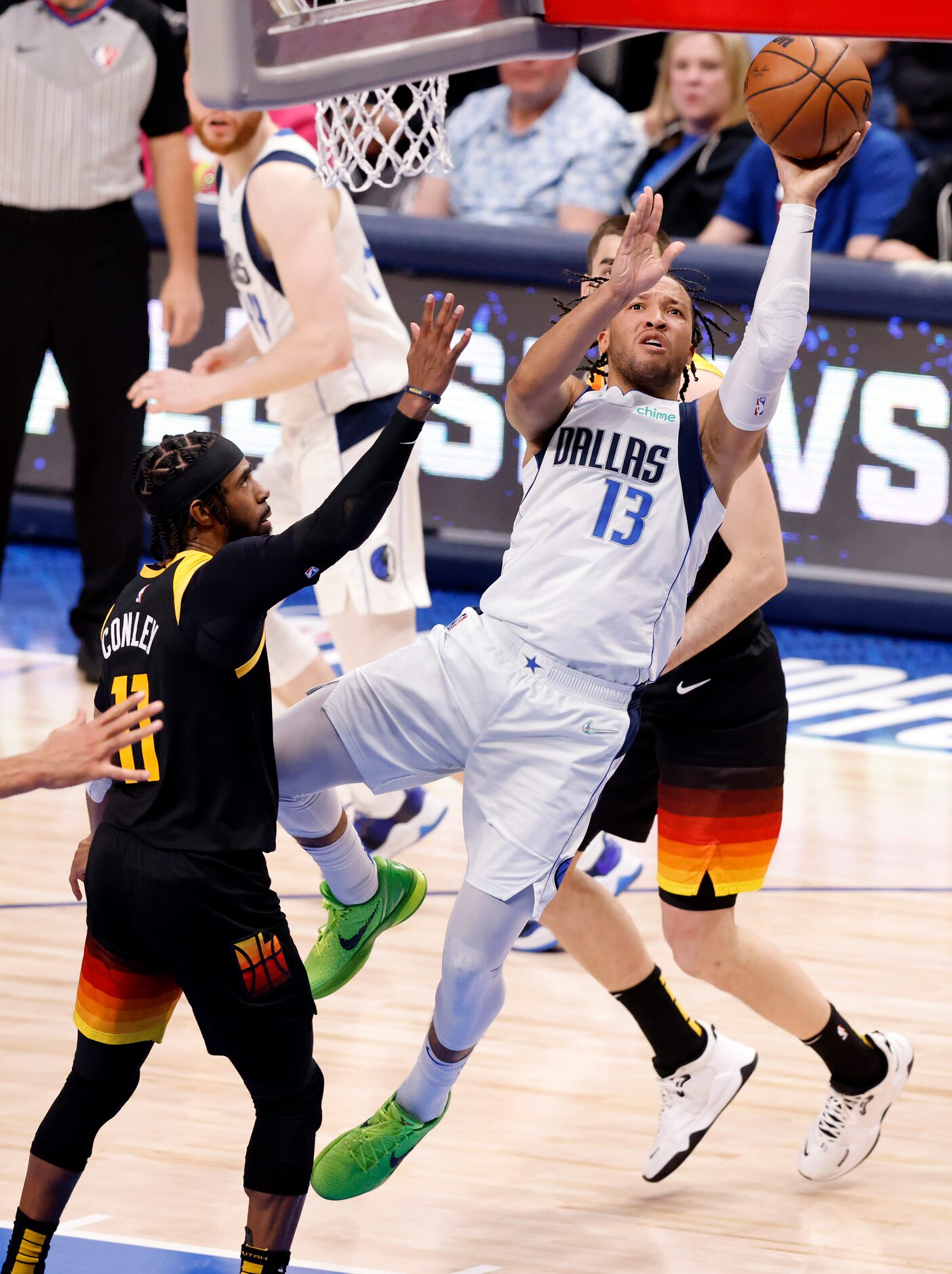 Dallas Mavericks guard Jalen Brunson (13) puts up an off-balance shot past Utah Jazz guard...