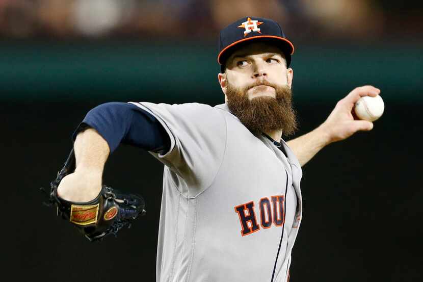 Houston Astros starting pitcher Dallas Keuchel (60) pitches in the second inning of play...