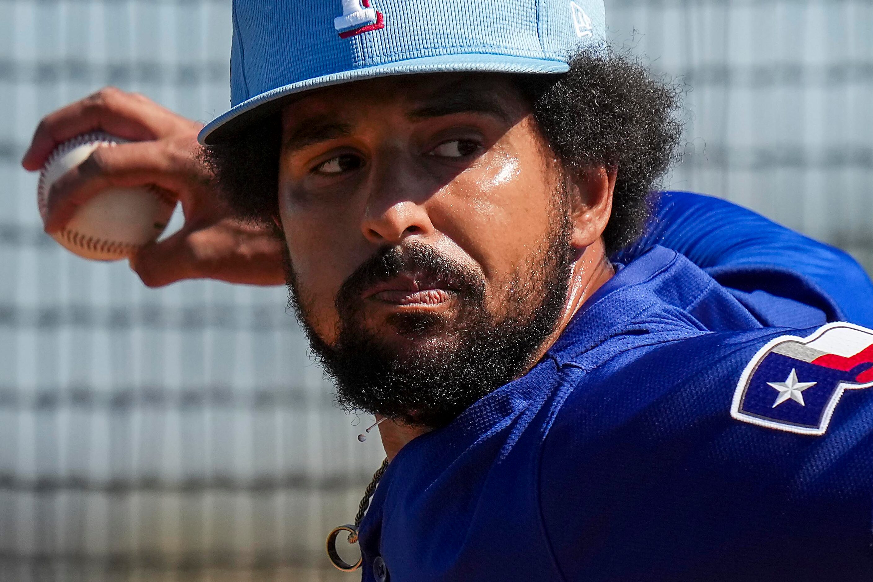 Texas Rangers pitcher Grant Anderson throws live batting practice during the first full...