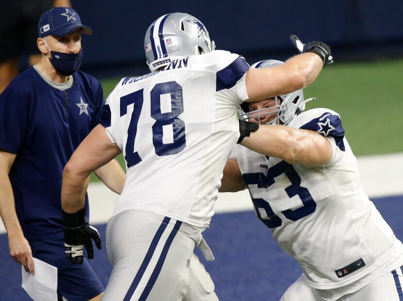 Dallas Cowboys center Tyler Biadasz (63) blocks Dallas Cowboys guard Cody Wichmann (78) in a...