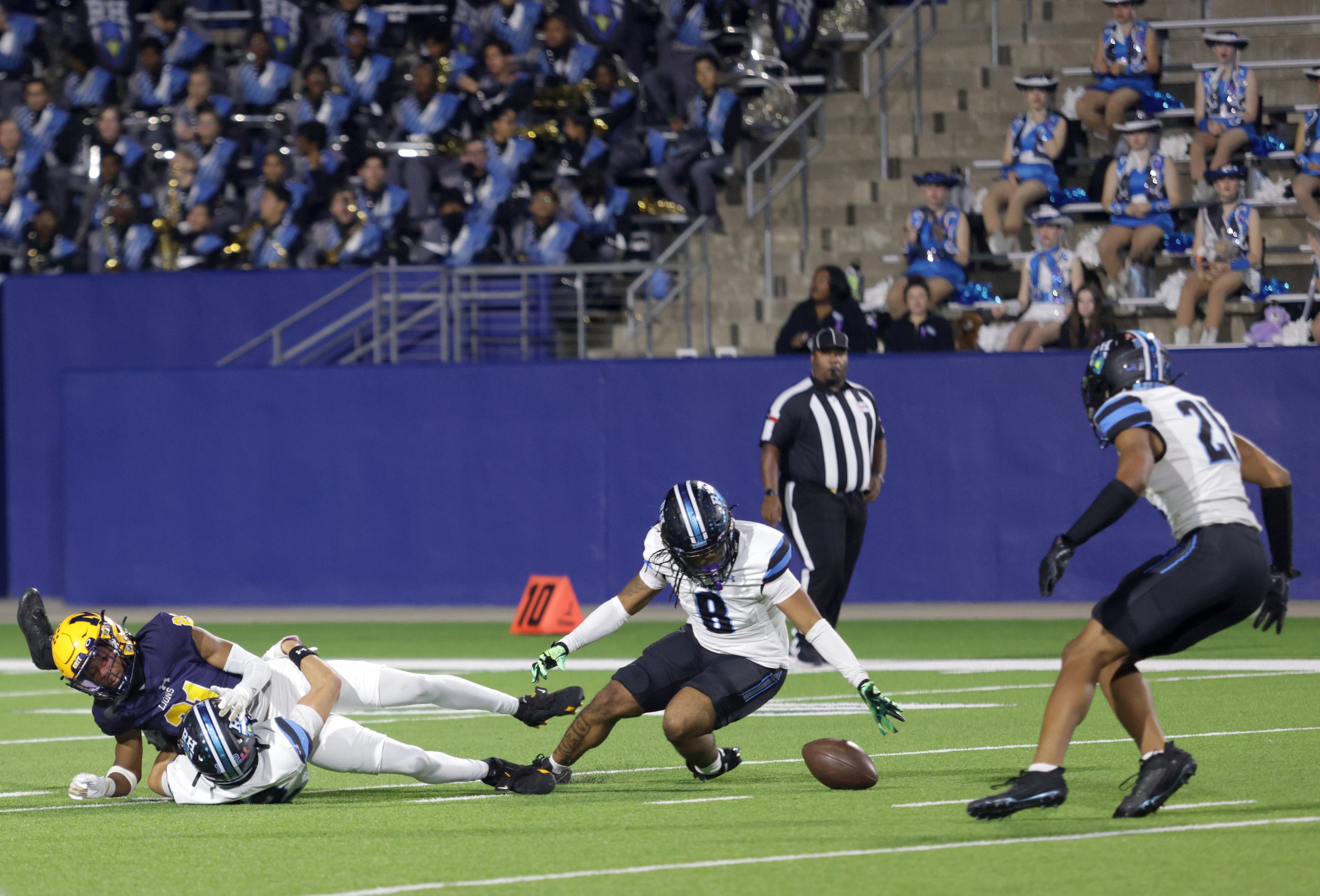 Rock Hill player #8 Jaylen Dean attempts to recover a fumble during the Prosper Rock Hill...