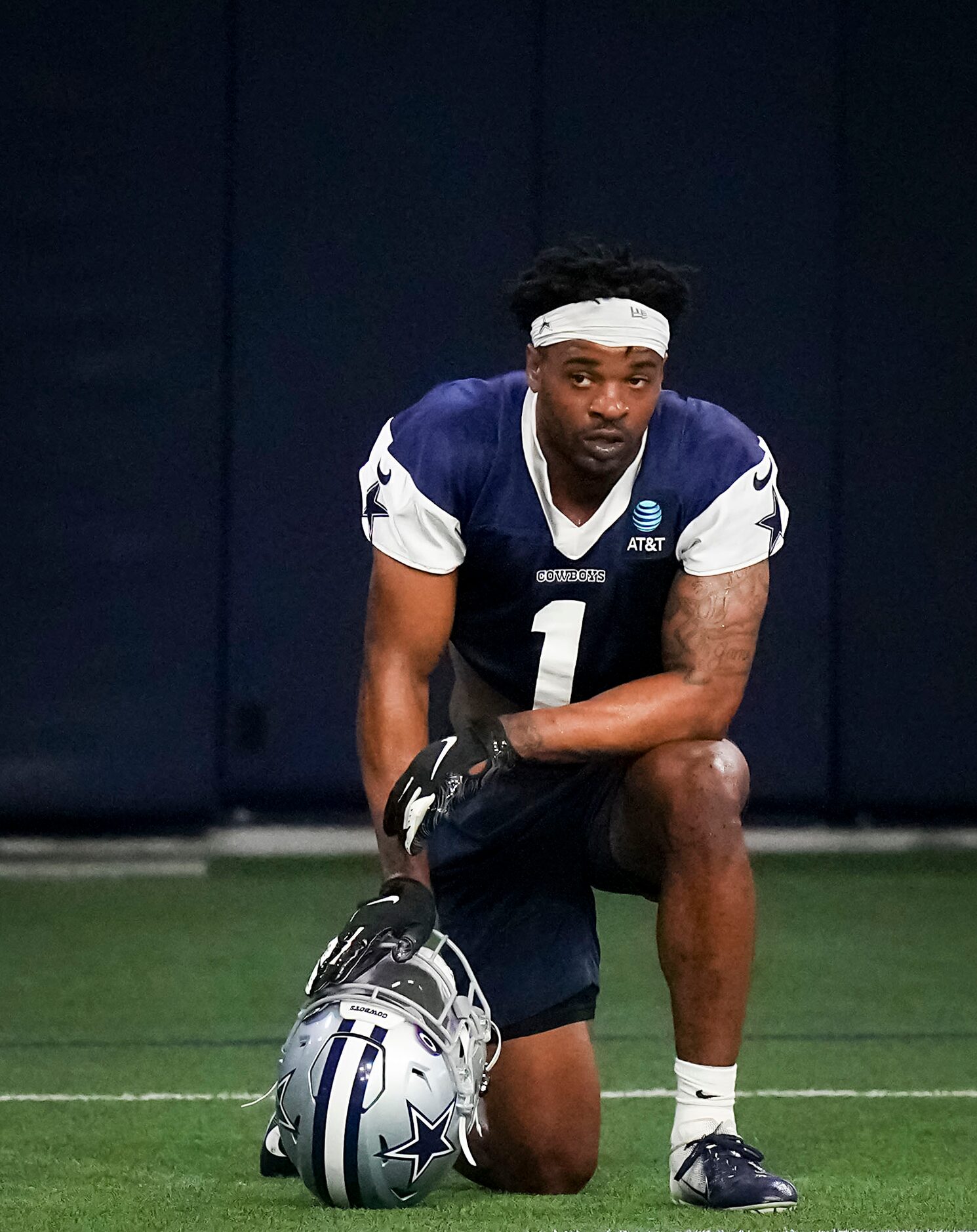 Dallas Cowboys cornerback Kelvin Joseph takes a knee between drills during the OTA team's...