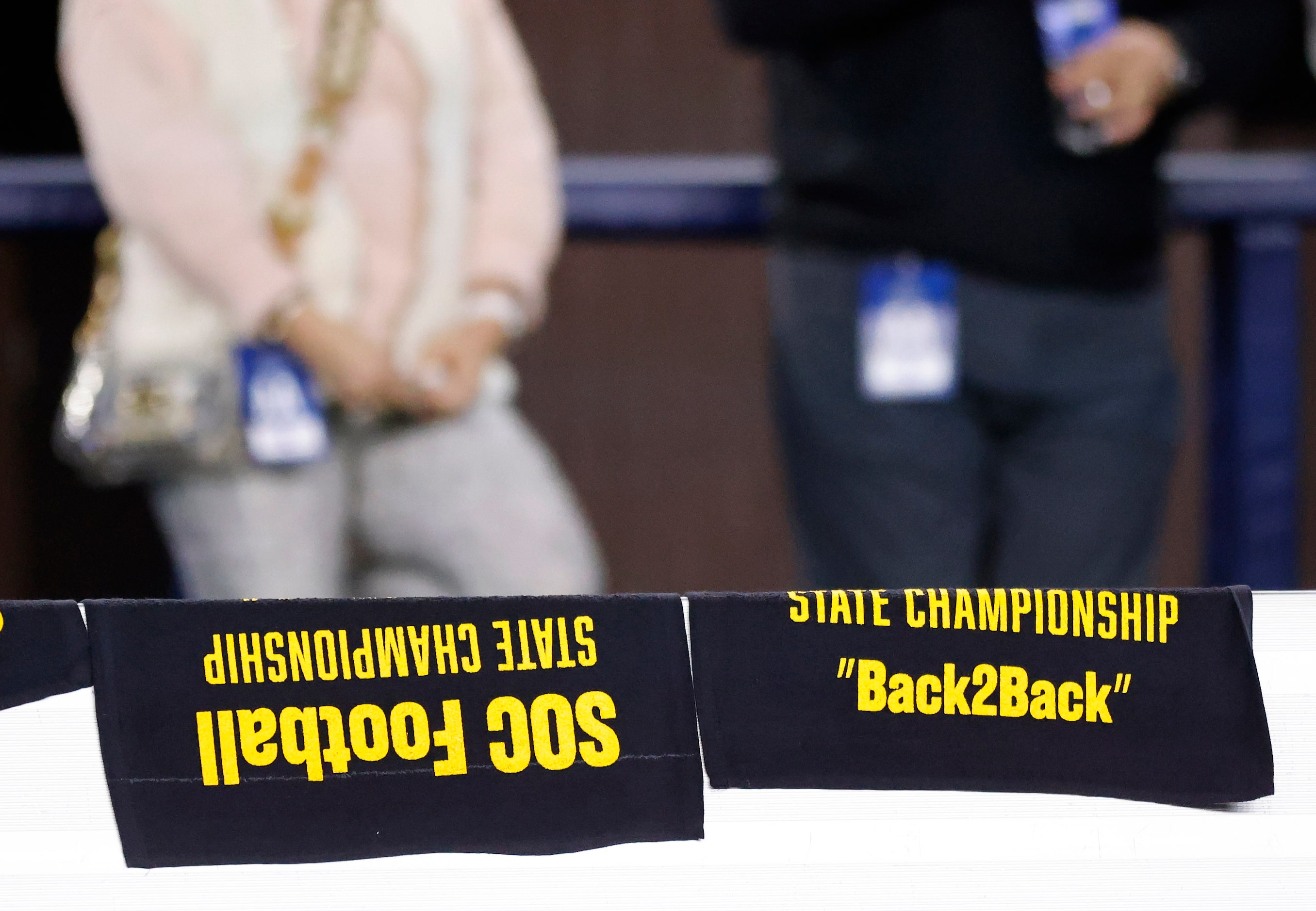 Back2Back State Championship towels line the bench before their Class 5A Division II state...