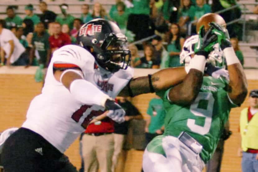 North Texas wide receiver Carlos Harris hauls in a pass in a game against Arkansas State...