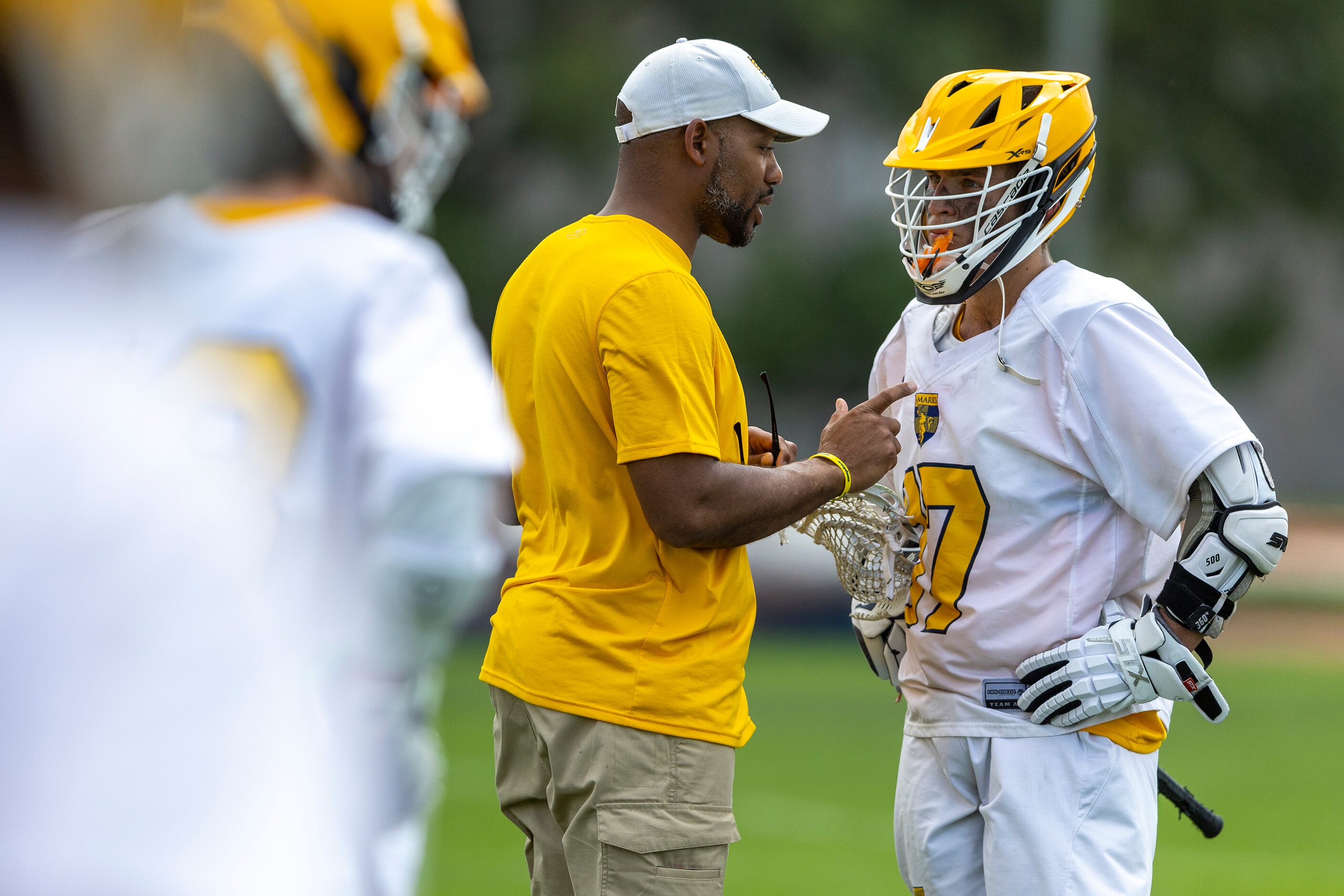 St. Mark's head coach Jason Leneau speaks with Henry Piccagli in time out against Episcopal...