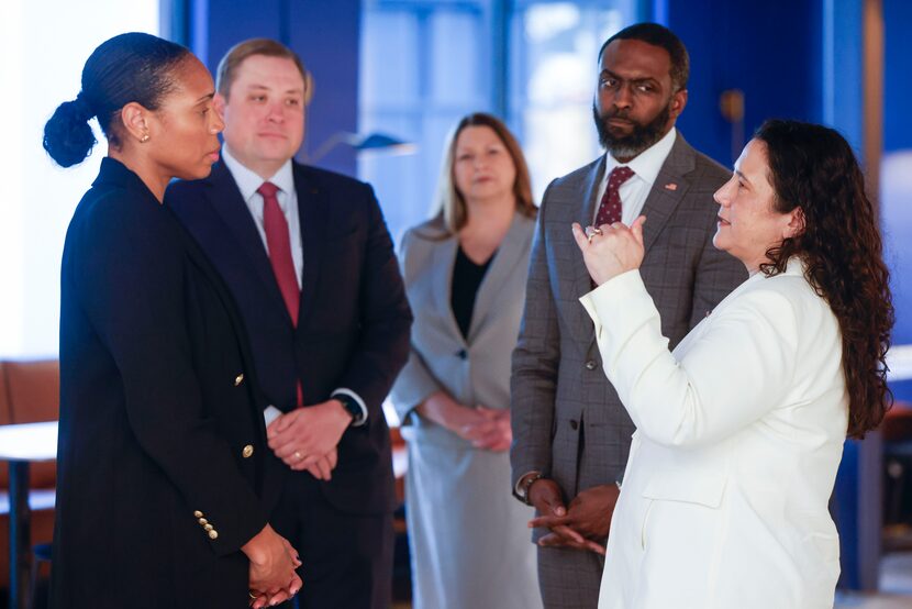 From left, Wesley Wellness Club owner Kyle Davis Degan, Frost Bank assistant Vice President...