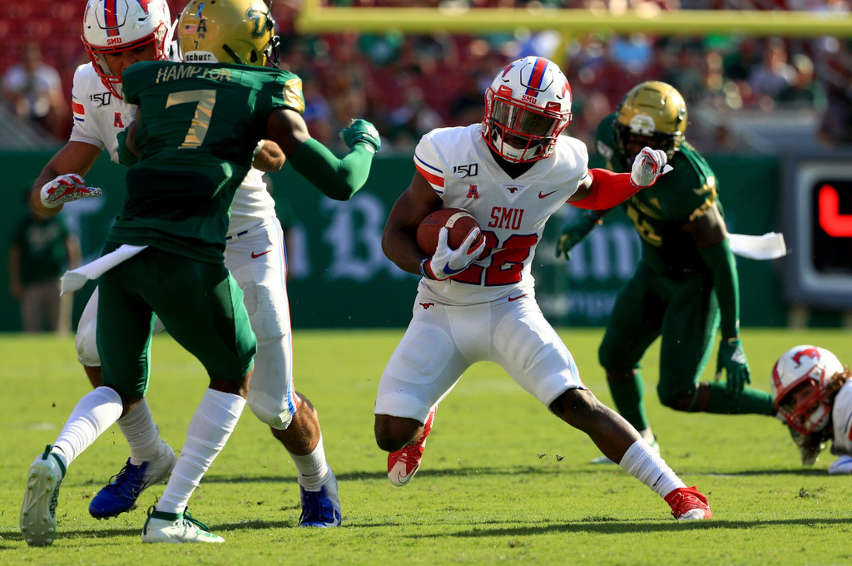 TAMPA, FLORIDA - SEPTEMBER 28: Myron Gailliard #22 of the Southern Methodist Mustangs rushes...