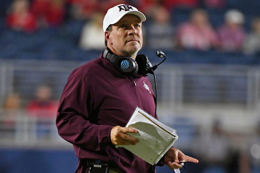 Texas A&M head coach Jimbo Fisher watches during the first half of an NCAA college football...