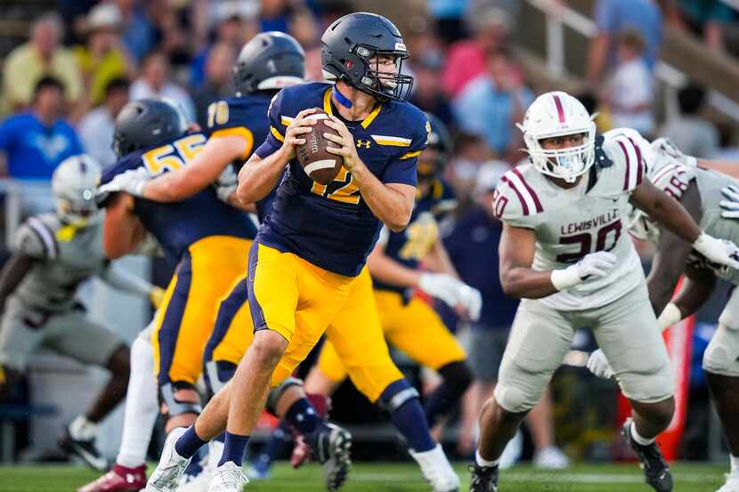 Highland Park quarterback Warren Peck (12) rolls out away from the Lewisville rush during...