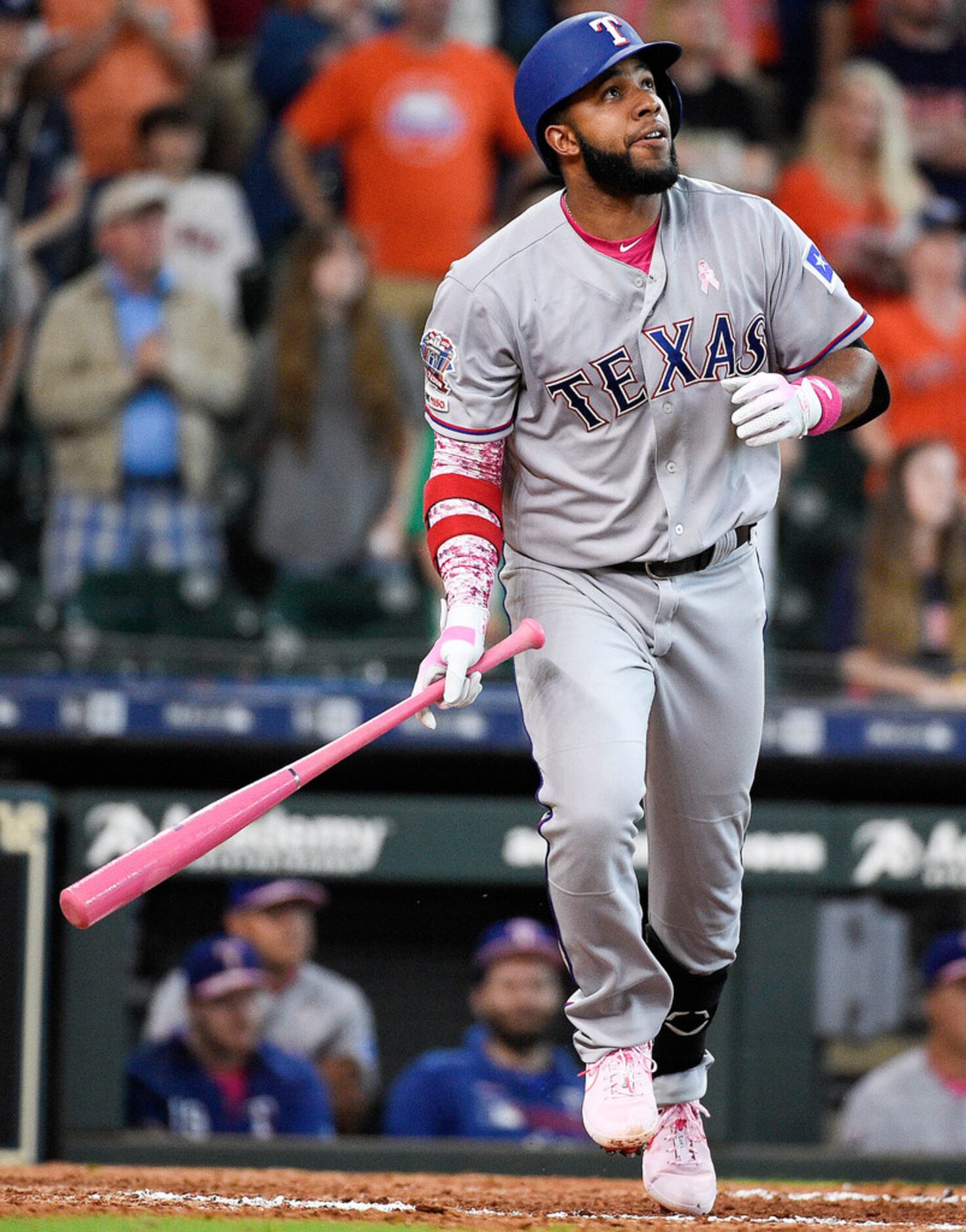 Texas Rangers' Elvis Andrus watches his two-run home run off Houston Astros relief pitcher...