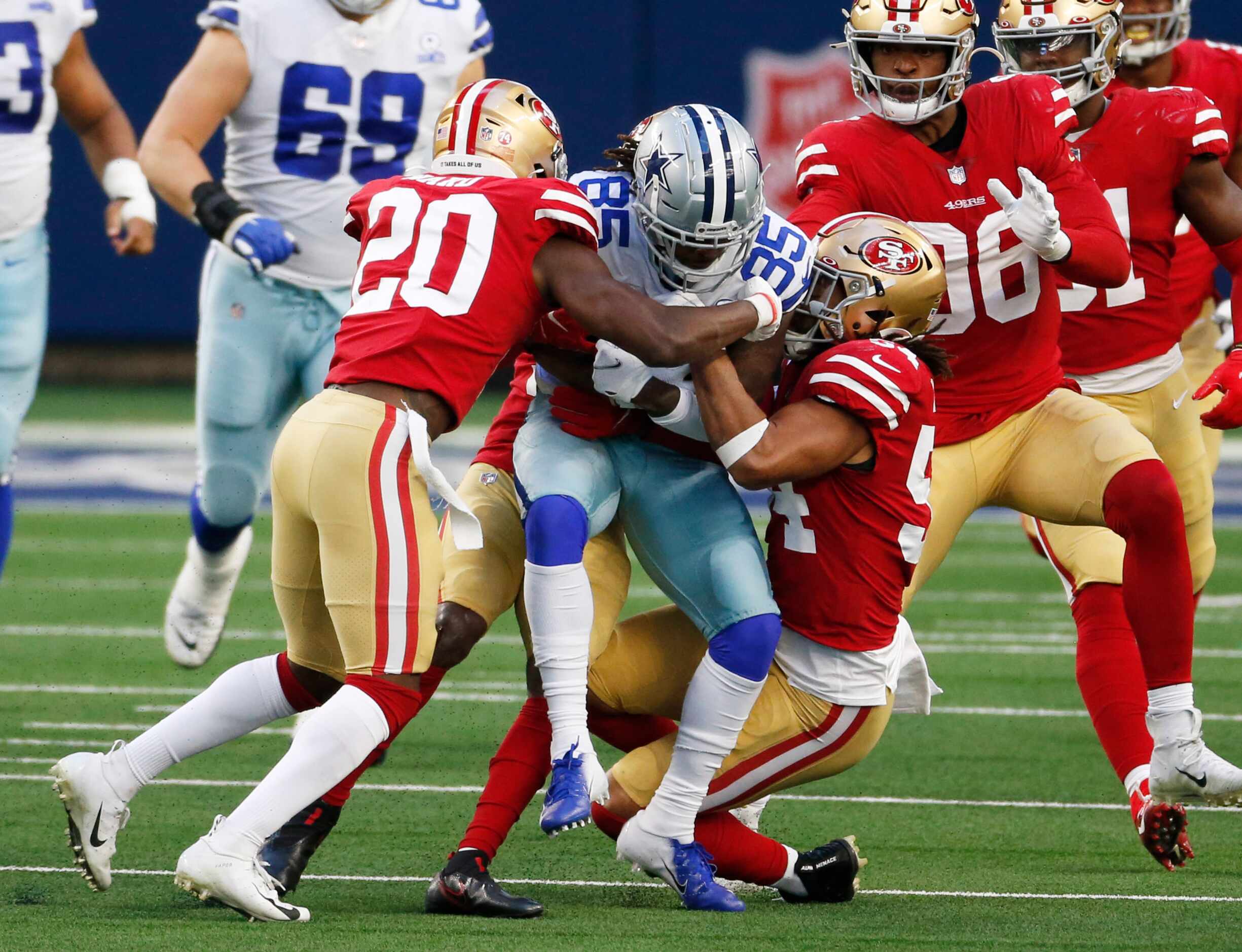 Dallas Cowboys wide receiver Noah Brown (85) is brought down by San Francisco 49ers free...